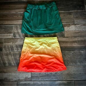 Two Athletic skirts with shorts running tennis workout stretchy M